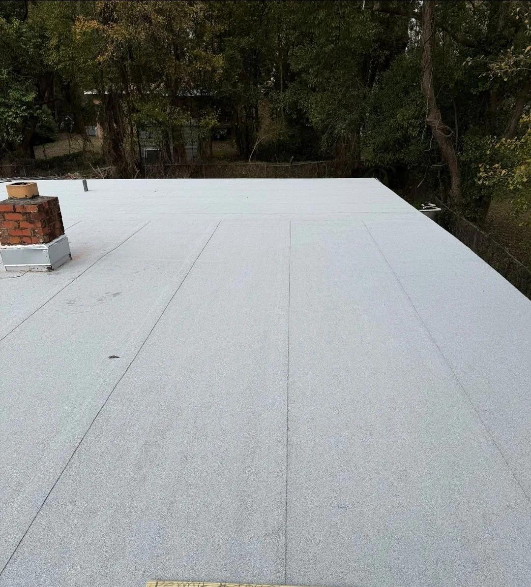 Flat roof coating application completed