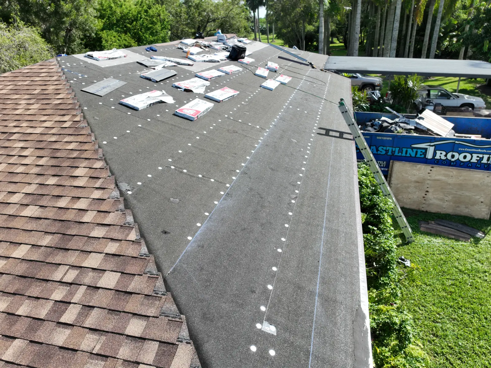 Shingle replacement in progress
