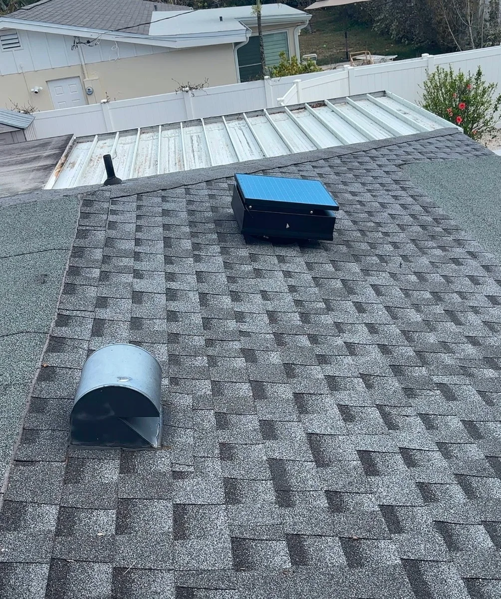 Solar attic fan recently installed on a shingle roof in Sarasota, FL